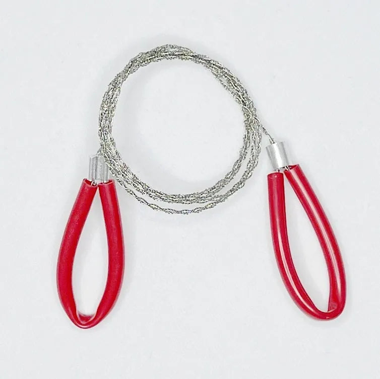 German stainless steel survival wire saw coiled to show compact size with black handles