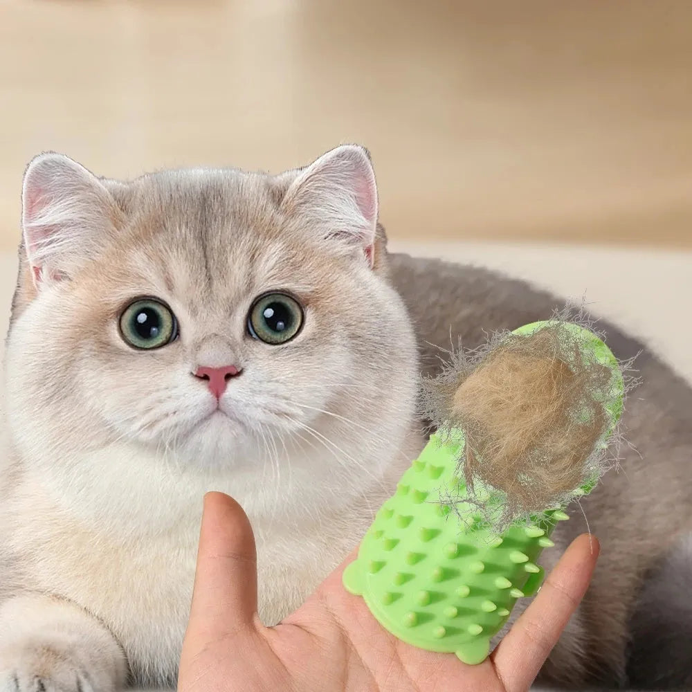 Adjustable silicone cat scratching grooming brush in black, mounted on a table leg.