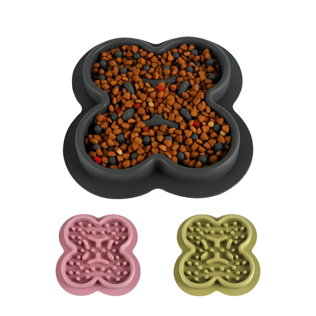 Blue silicone pet licking pad slow feeder mat on a wooden floor