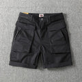 Men's straight cut cotton cargo shorts in army green with multiple pockets on the legs.