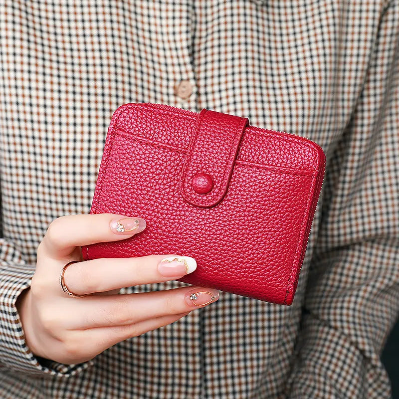 Beige women's short PU wallet with lychee pattern and visible stitching