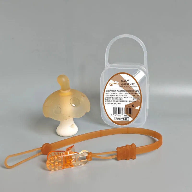 Small mushroom-shaped silicone chewing gum with a chain and transparent storage box in pink or nano colour.