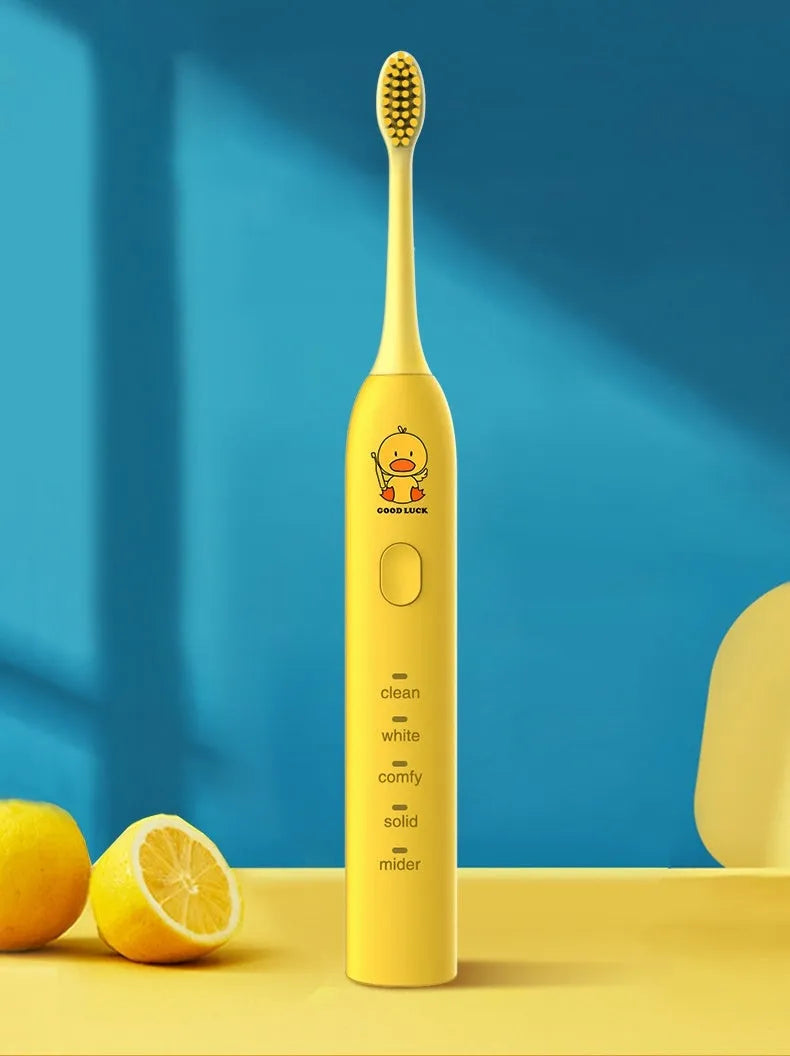 Yellow rechargeable smart electric toothbrush with soft bristles and a small duck design.