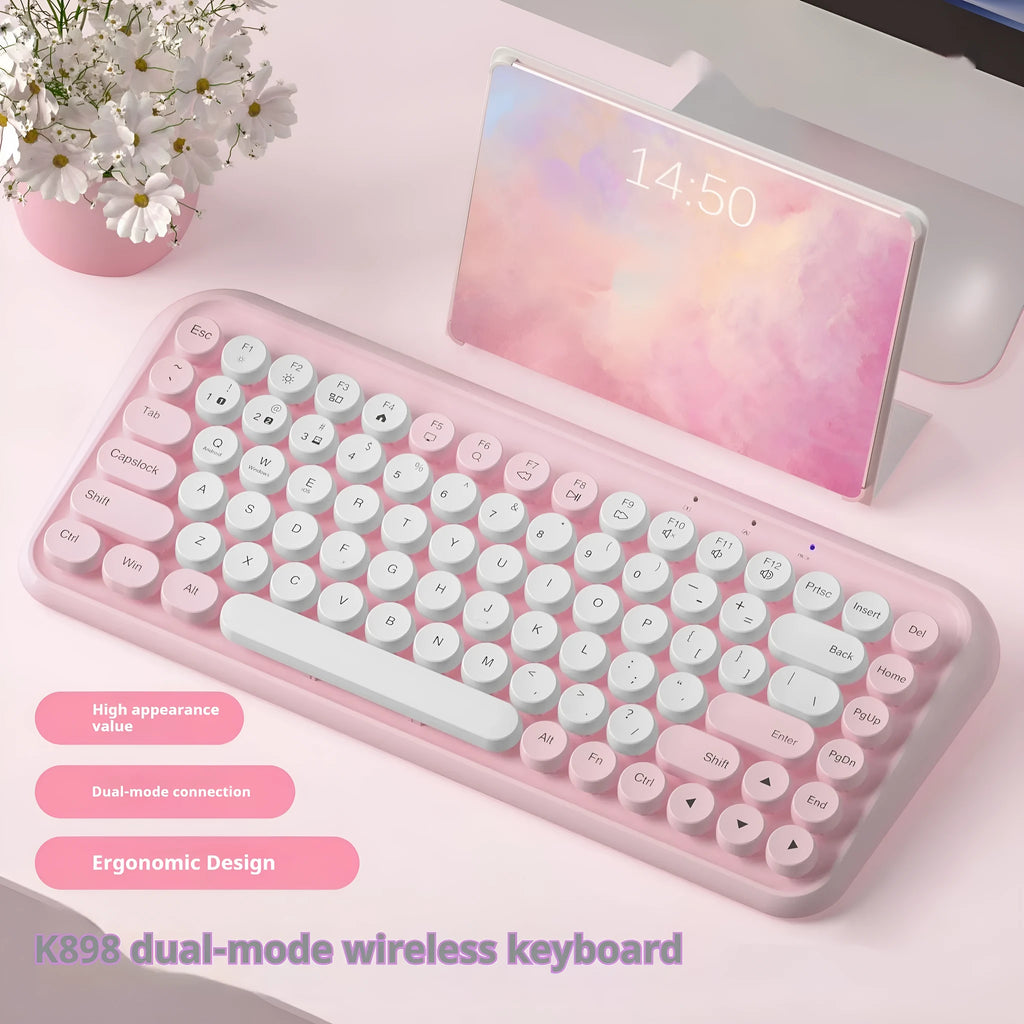 Pink dual-mode Bluetooth portable keyboard with silent keys and compact design