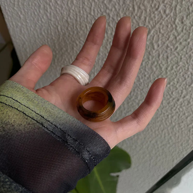 Geometric resin wide ring with irregular shape in retro Chinese style showing earthy colour options