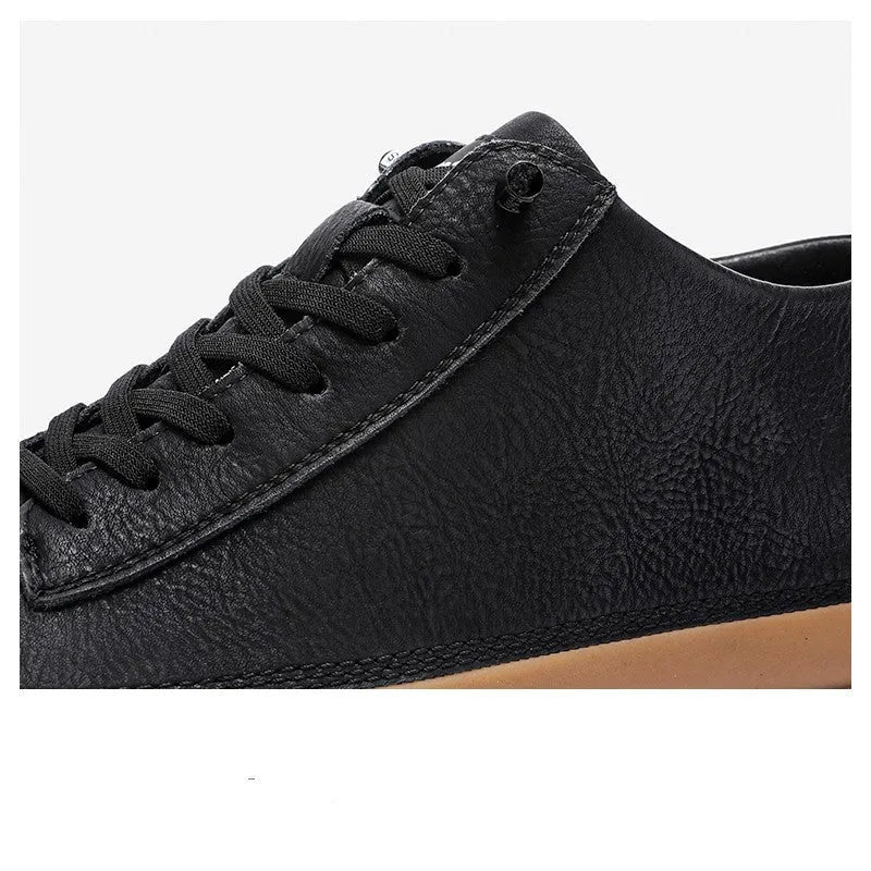 Men's black and white casual leather shoes with round toe and flat rubber sole