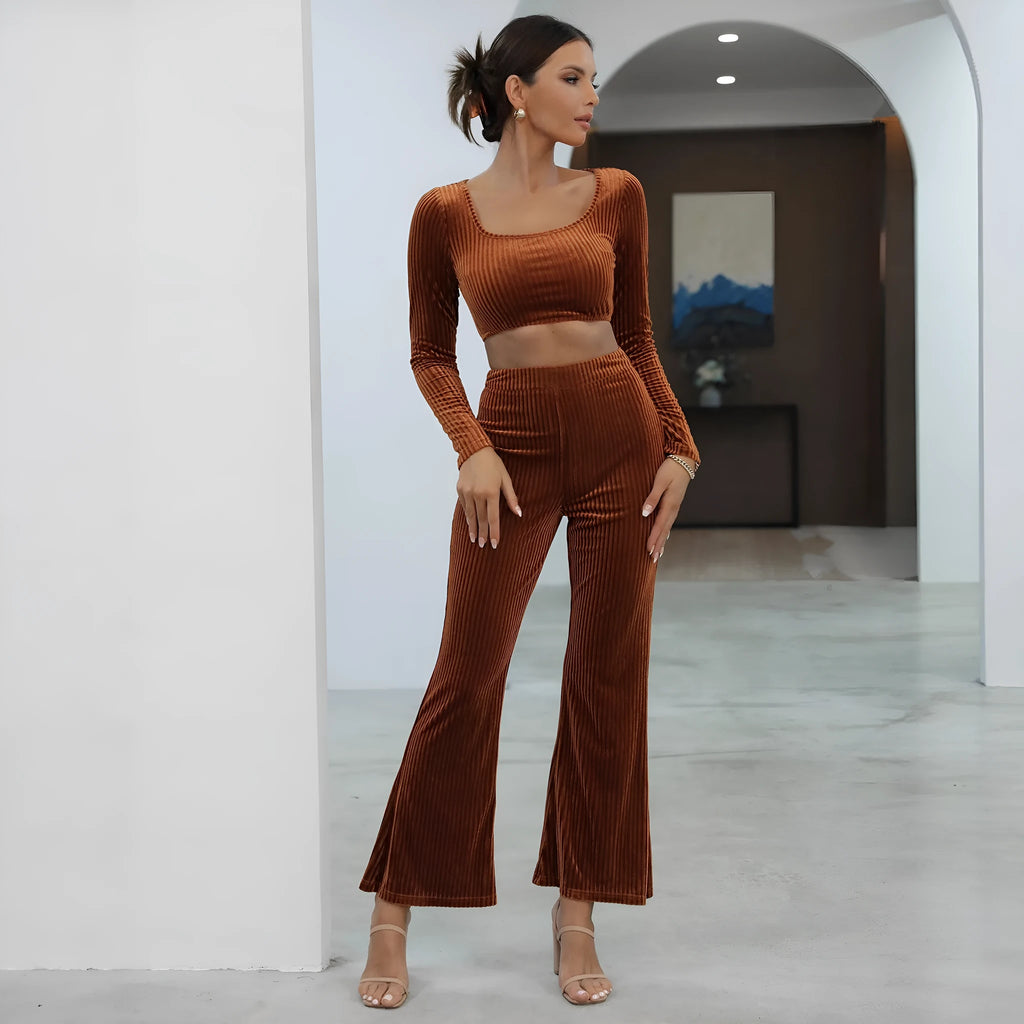 Caramel-colour long sleeve sweater and matching trousers casual set on a hanger.