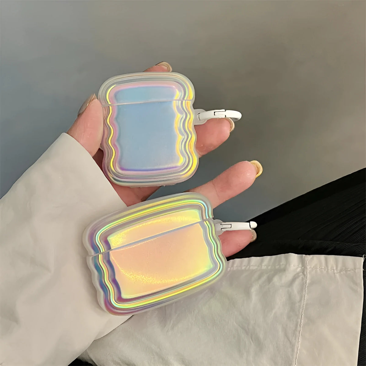 Silicone AirPods case with holographic laser ring design for multiple Apple AirPods models