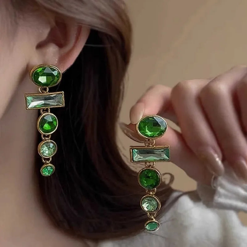 Retro green geometric earrings with dangling tassels and zircon detailing on alloy studs