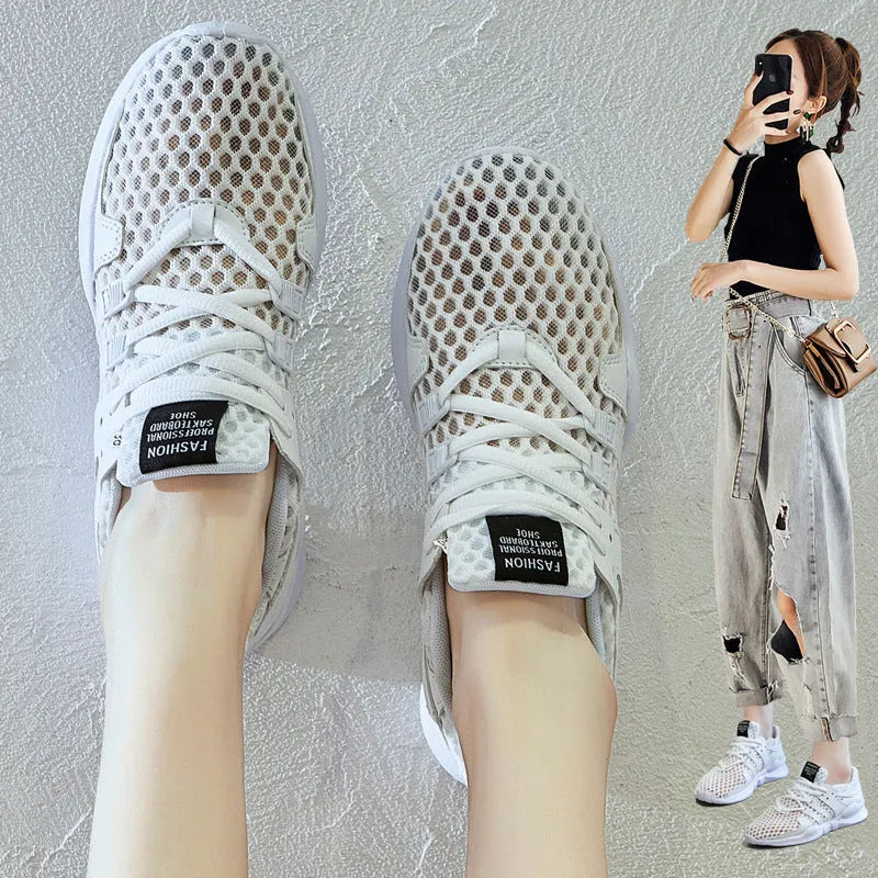 Men's black mesh casual sneakers with hollow breathable design and low-top cut