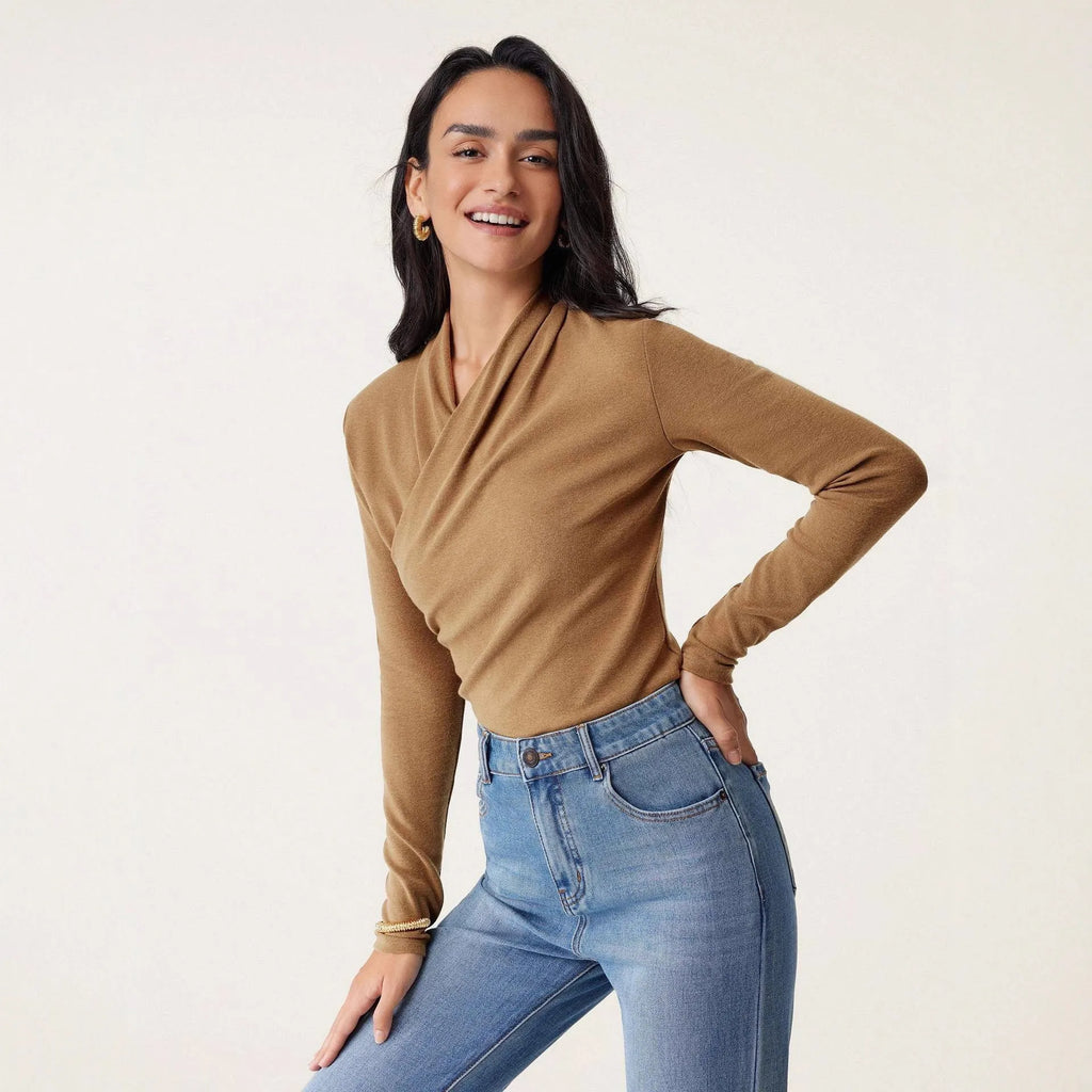 Camel-coloured women's slim-fit polyester pullover sweater on a hanger.