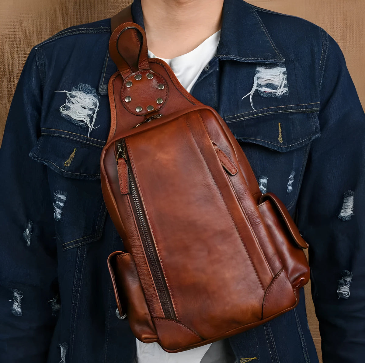 Men's genuine leather chest crossbody messenger bag, 11 inch, in light brown or black with polyester cotton lining.