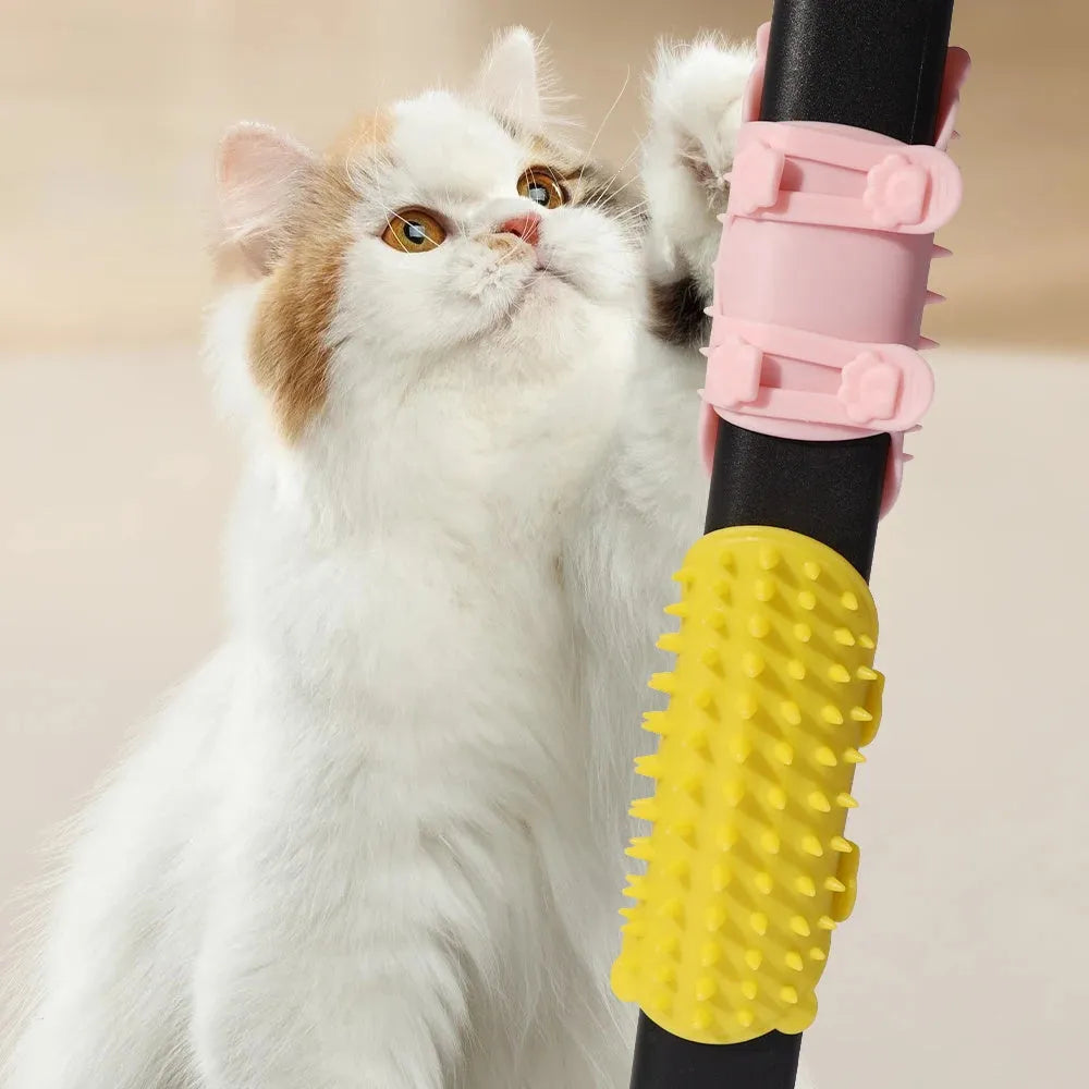 Adjustable silicone cat scratching grooming brush in black, mounted on a table leg.