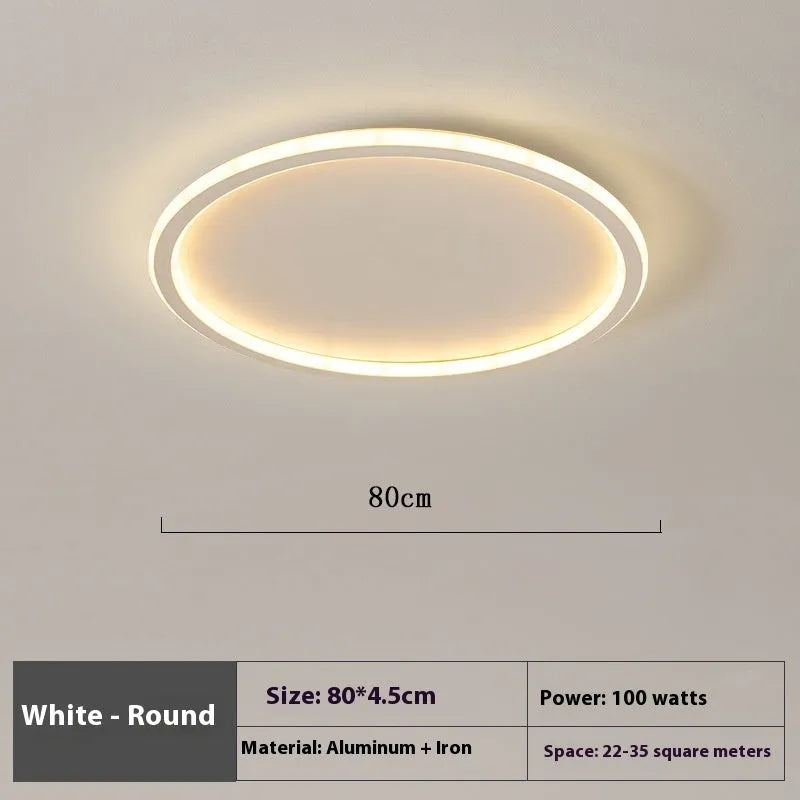 Modern minimalist black ceiling lamp with LED lights and dimming control on a bedroom ceiling.
