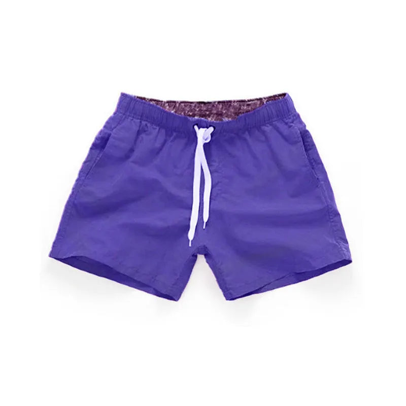 Men's straight leg beach shorts in polyester fabric available in multiple colours and sizes up to 4XL