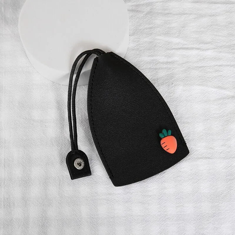 Cartoon PU leather pull-out car key case measuring 14 x 7.5cm with colourful designs