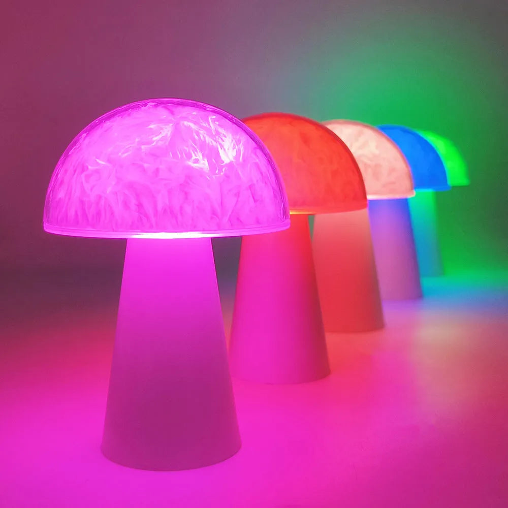 Mushroom-shaped remote control ambience light with colourful RGB lighting on wooden surface