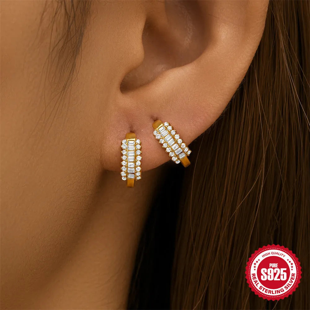 Sterling silver geometric stud earrings with small round diamond design in gold and silver finishes