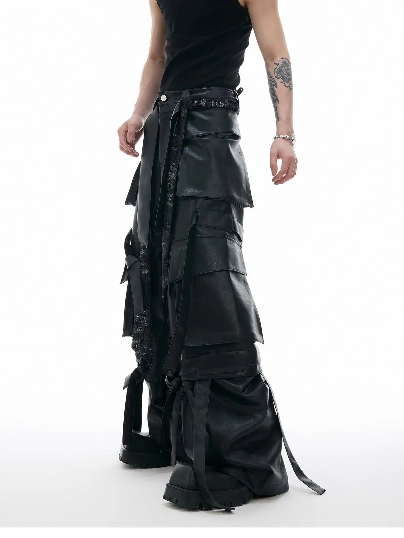 Black loose-fit quilted trousers with multiple pockets and stitching detail