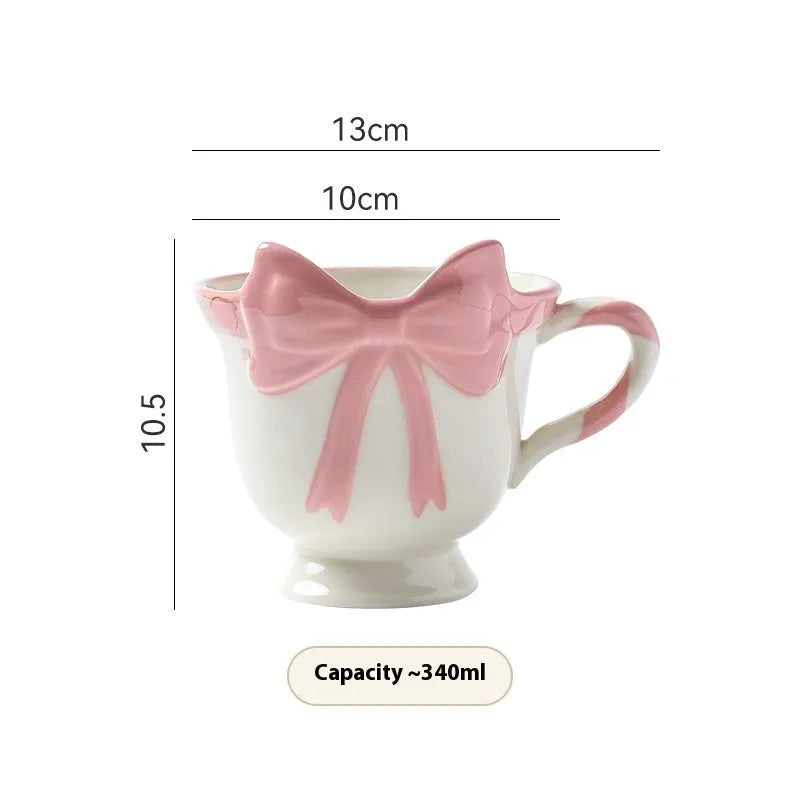 Ceramic mug with bow and heart decoration in Black Pink or White Powder colour, 301-400ml capacity