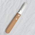 Pet stripping comb with wood handle and metal teeth for removing hair from dogs and cats