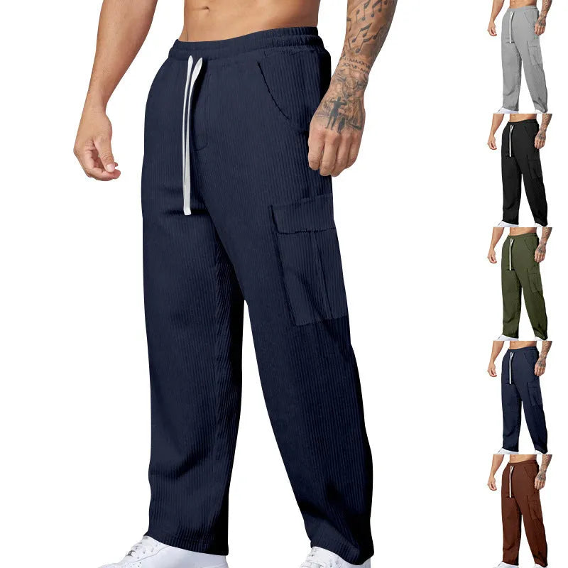 Men's loose-fitting corduroy cargo trousers in a straight wide-leg style with a drawstring waist.