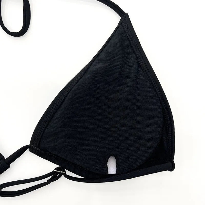 Women's black mesh four-piece bikini set with long sleeve crop top and high-waisted briefs