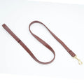Black PU leather dog lead with padded handle and metal buckle clasp