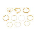 Women's gold coloured openwork flower ring with glossy electroplated finish
