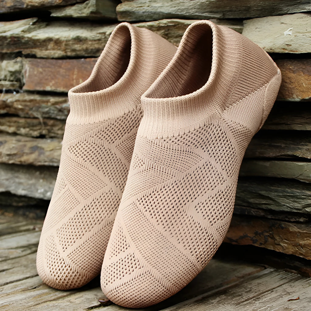 Camel colour Latin dance shoes with simple print, cotton mesh upper, and leather sole on a neutral background.