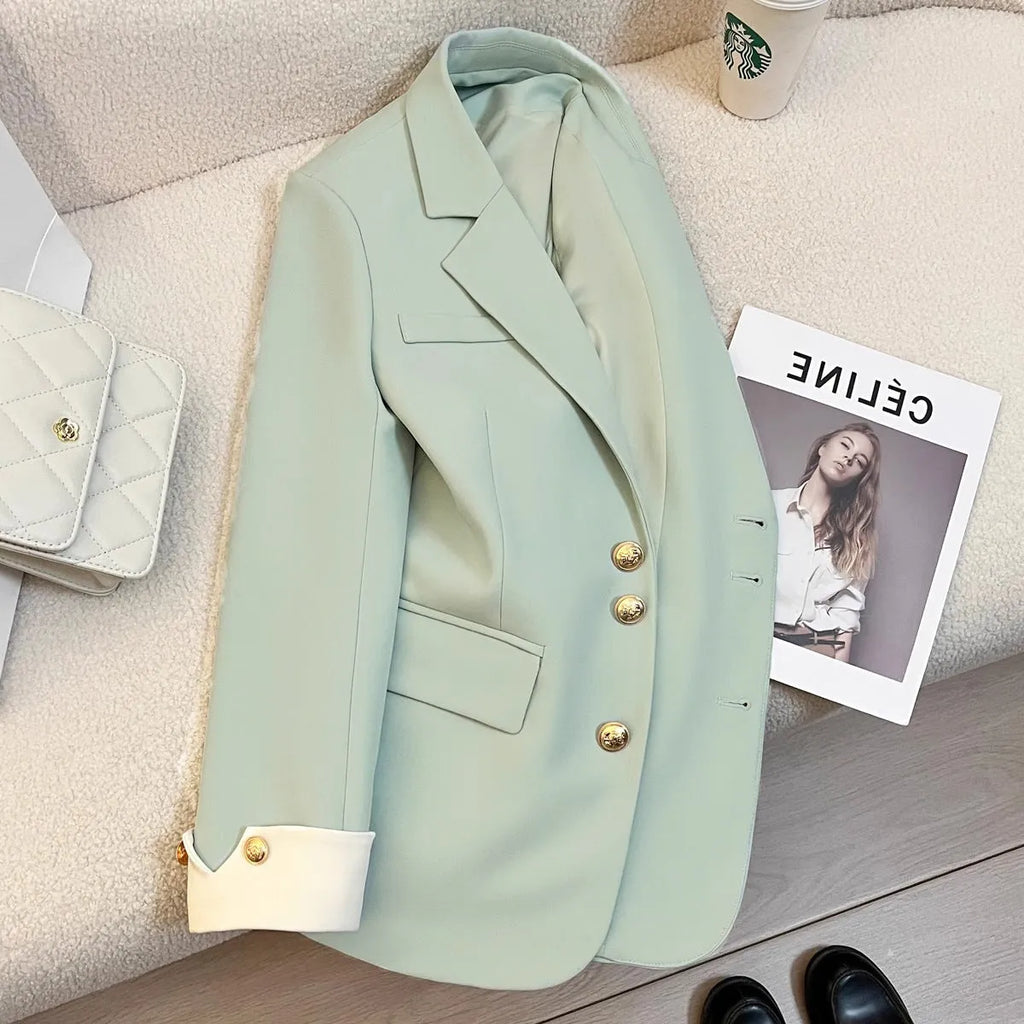 Korean style women's loose fit coat in beige or black with pocket details