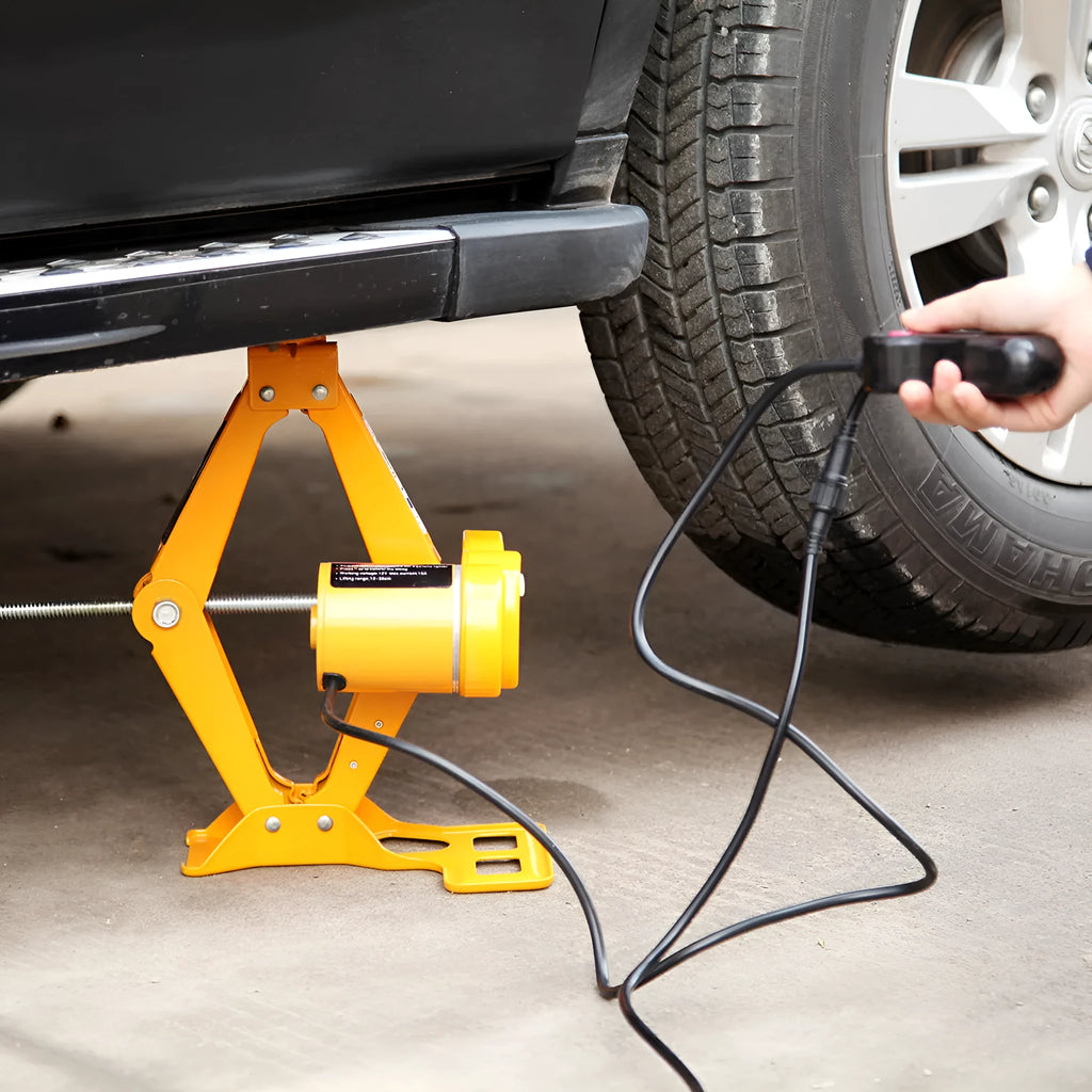 Electric hydraulic vehicle jack kit with 2 tonne capacity mounted in car for roadside assistance