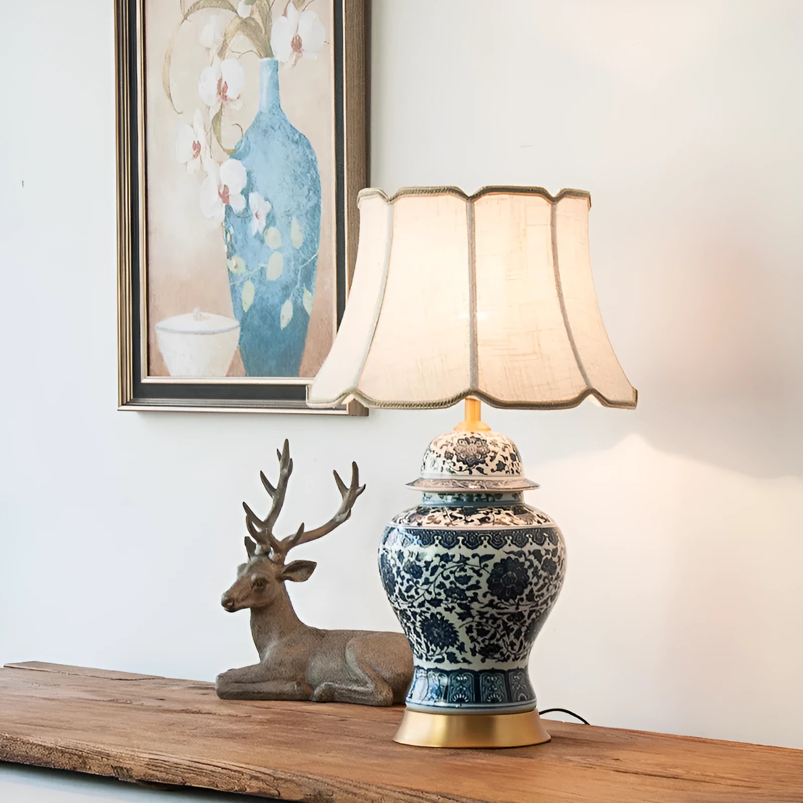 Blue and white porcelain Chinese style table lamp with ceramic base and cloth shade.