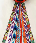 Colourful decorative ribbon streamer for attaching to a child's sports helmet.