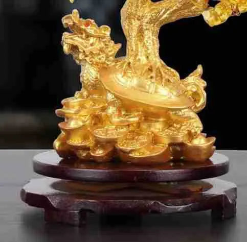 Citrine coloured resin turtle money tree Feng Shui ornament measuring 18 by 11 by 23 centimetres