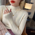 Women's slim fit viscose knitted long sleeve shirt in various colours including apricot, black, and gentle blue.