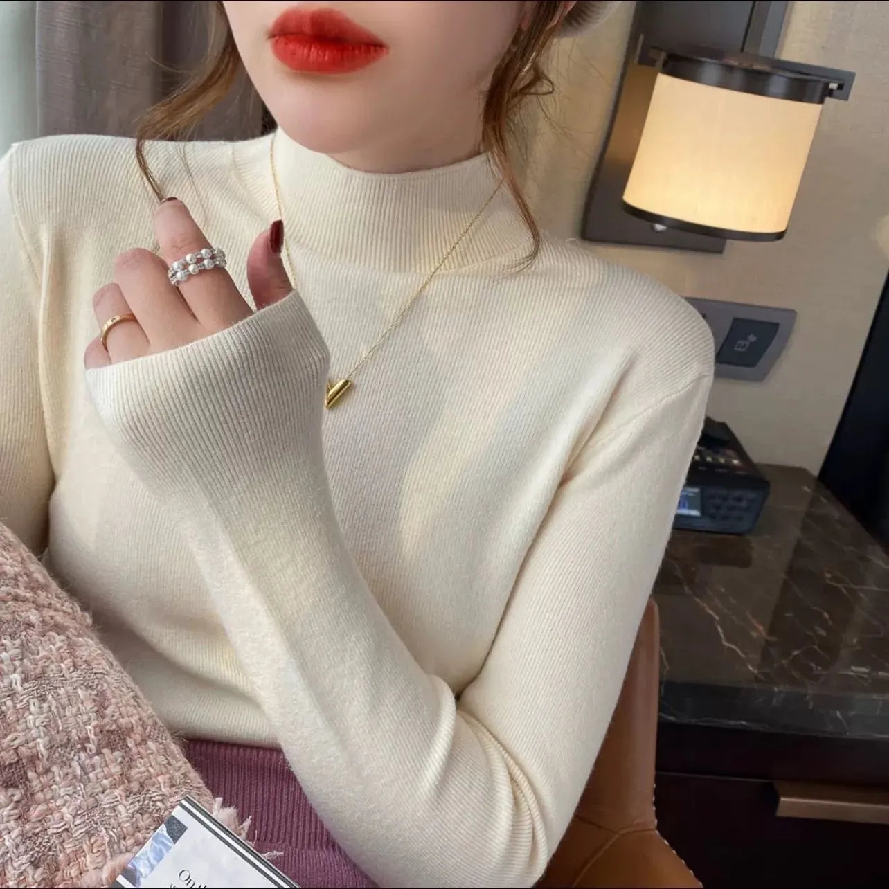 Women's slim fit viscose knitted long sleeve shirt in various colours including apricot, black, and gentle blue.