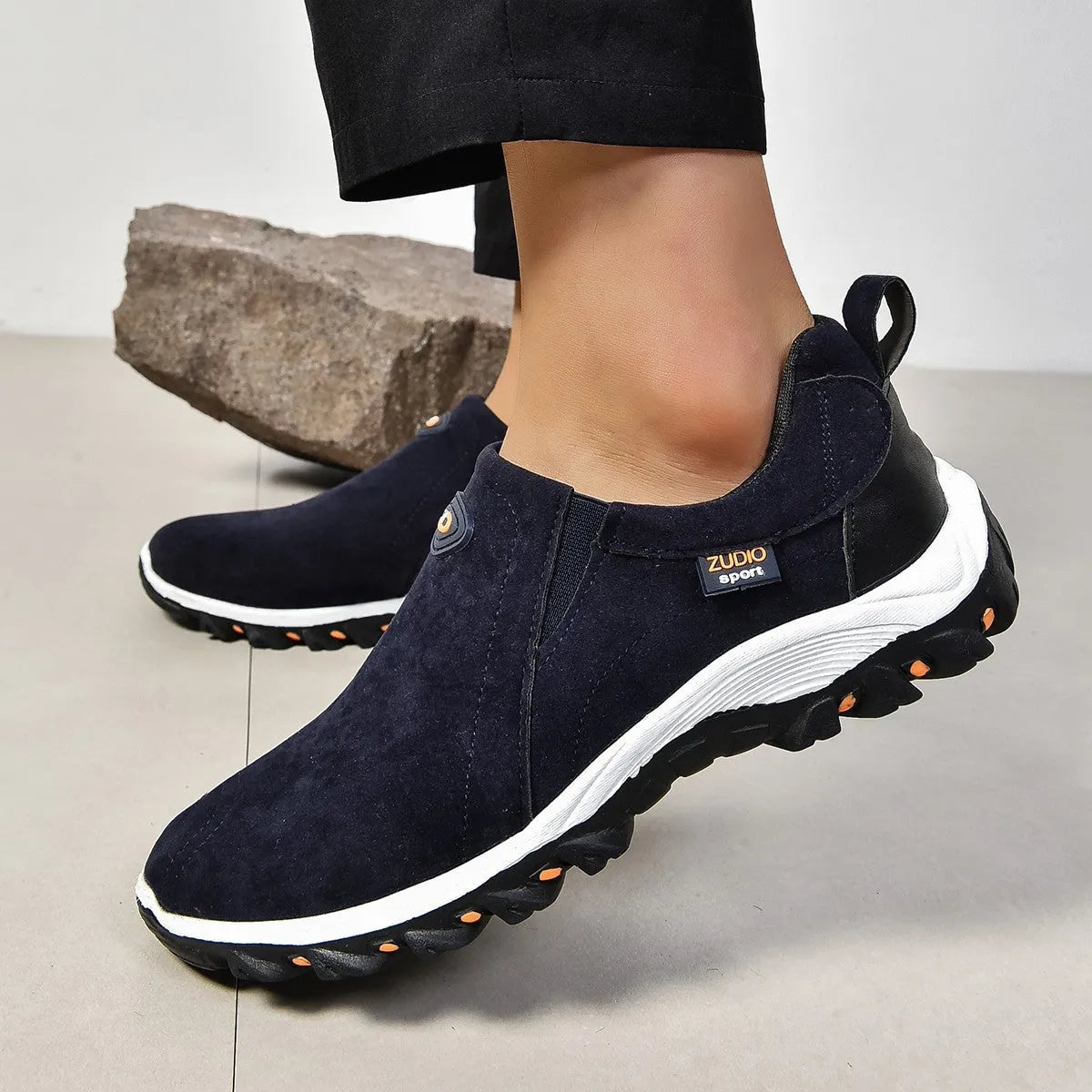 Men's round toe thin casual shoe in multiple colours on a white background.