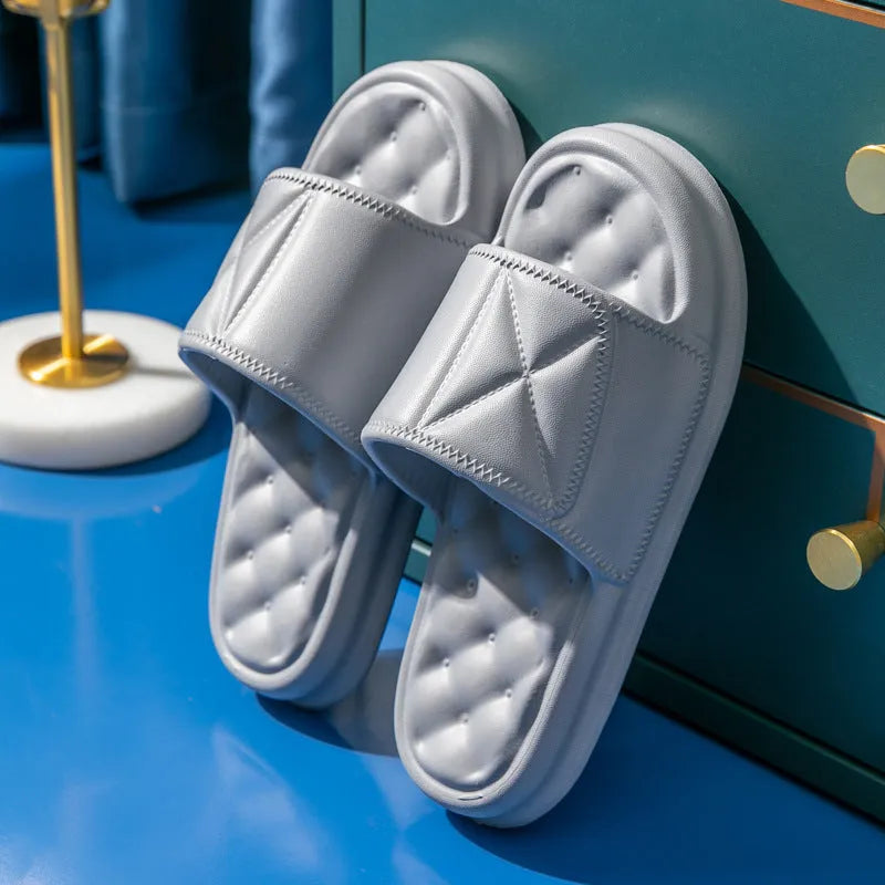 Pair of soft EVA bathroom sandals with a textured non-slip sole, shown in a choice of colours.