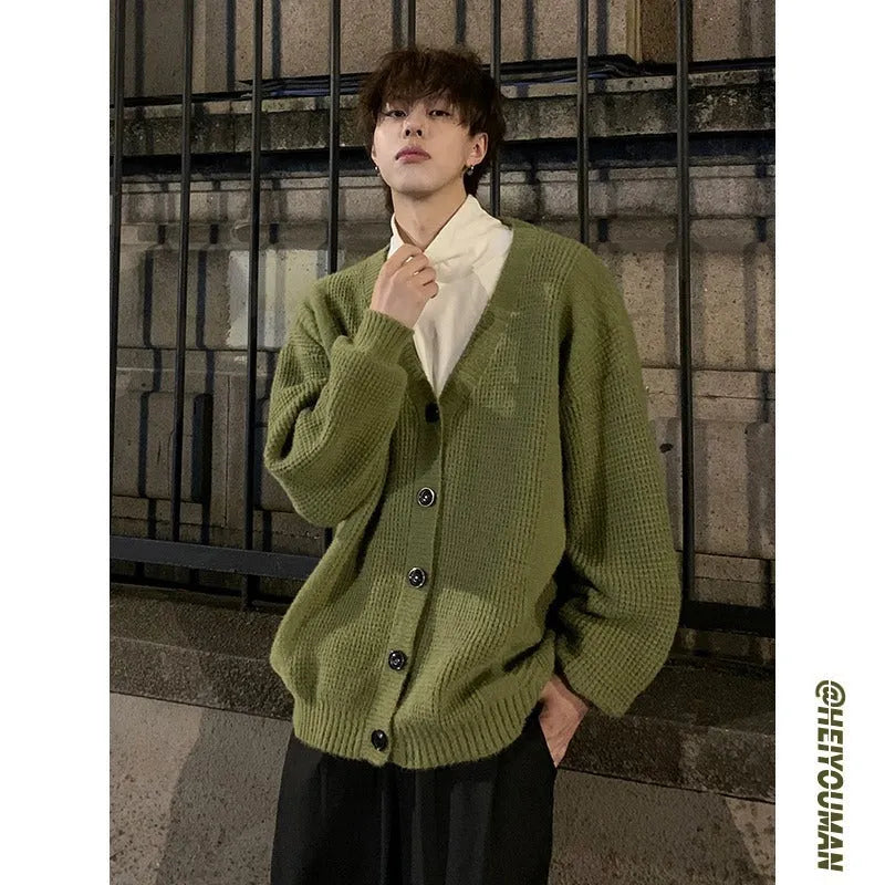 Men's loose fit V-neck cardigan jumper in a solid colour cotton blend fabric.
