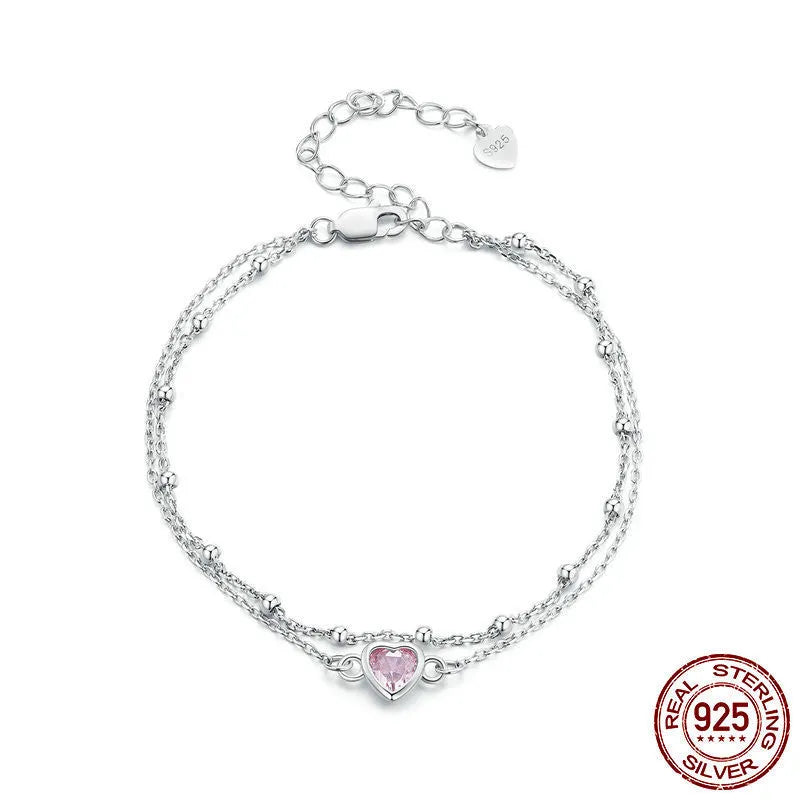 Women's 925 sterling silver bracelet with heart-shaped pendant on adjustable chain
