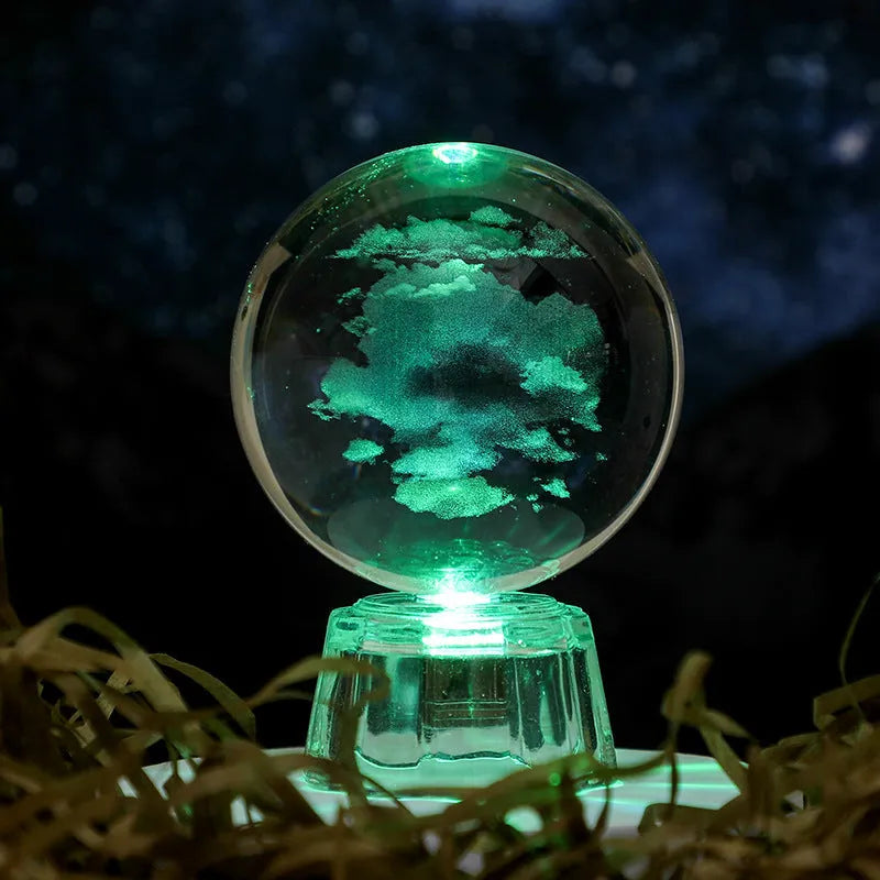 Transparent luminous crystal ball ornament with inner carving on fixed base