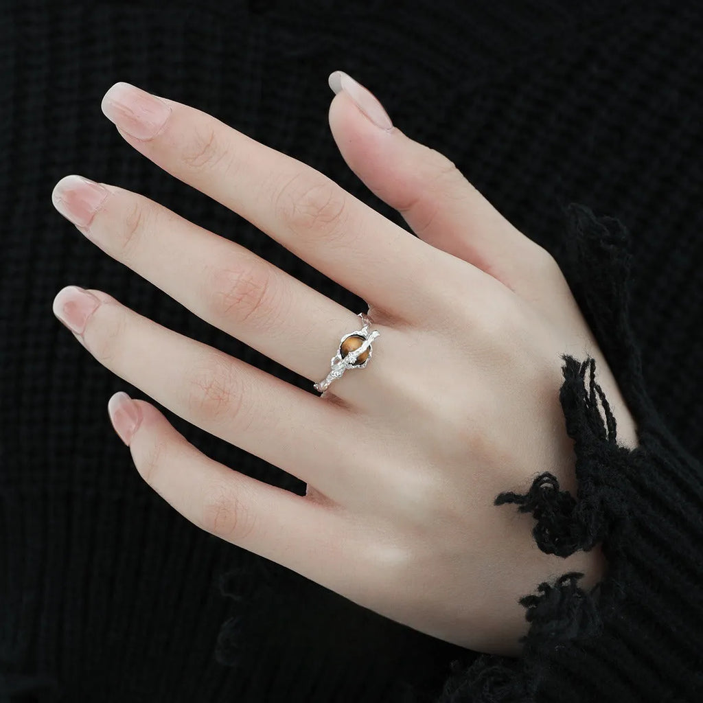 Women's adjustable Saturn ring in silver with white gold electroplated finish and open design