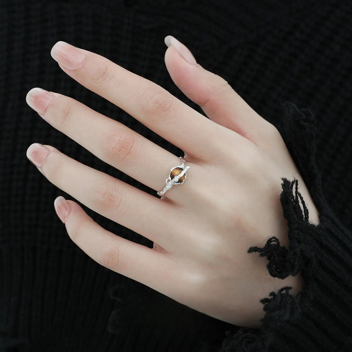 Women's adjustable Saturn ring in silver with white gold electroplated finish and open design