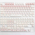 Full set of PBT key caps for mechanical keyboards showing over 98 keys with uniform 1.5mm profile height