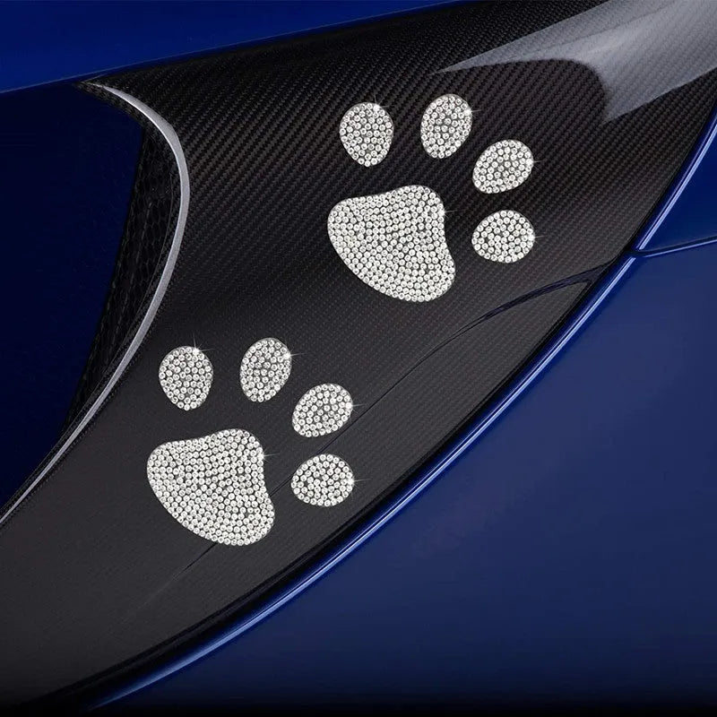 Glass car sticker decal showing bear paw or butterfly design choice on clear background.