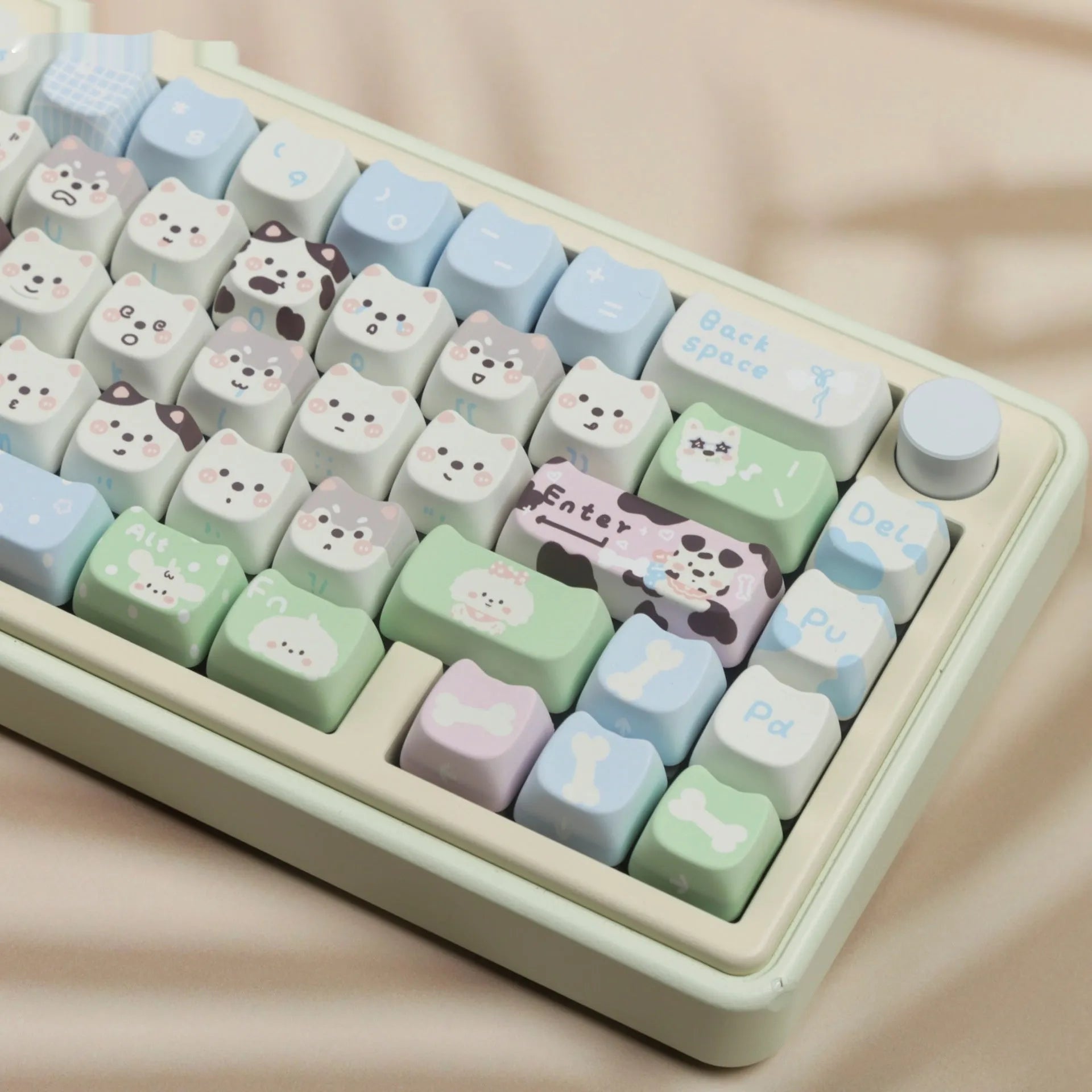PBT sublimation keycap set showing detailed puppy and cat designs on mechanical keyboard keys