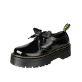 Women's thick-soled leather shoes with lace-up closure and decorative ribbon detailing