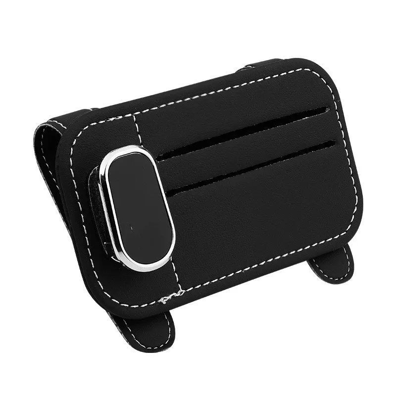 Beige cowhide leather automotive sun visor card holder with a glasses clip attached.