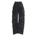 Women's blue high waist wide leg jeans with multiple pockets on a neutral background.